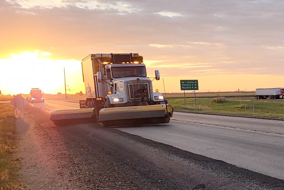 DM loadmore and dump truck cleaning up after a job